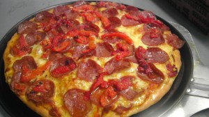 Pepperoni Pizza - homemade pizza sauce, mozzarella, pepperoni, marinated roasted capsicum