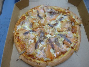 Marinara Pizza - homemade pizza sauce, mozzarella, smoked salmon, shrimp, tuna, anchovies