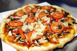 Vegetarian Pizza with extra topping of pineapple